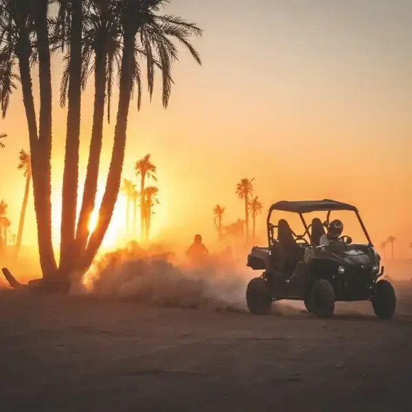 Buggy convoy kicking up dust on a half-day adventure tour through the rugged landscapes surrounding Marrakech