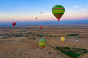 Discover the Thrilling Adventure of Parachuting in Marrakech 1 Parachuting over the stunning landscapes of Marrakech, showcasing the city’s unique blend of desert and urban scenery.