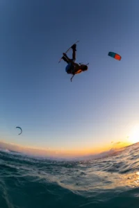 The Ultimate Thrill: Exploring the Best Skydiving Companies in Your Area 3 Thrilling skydivers captured mid-air, enjoying an exhilarating jump with stunning views of the landscape below.