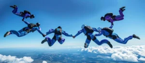 The Ultimate Thrill: Exploring the Best Skydiving Companies in Your Area 1 A group of enthusiastic skydivers preparing for an exhilarating jump, showcasing various skydiving company logos and equipment.