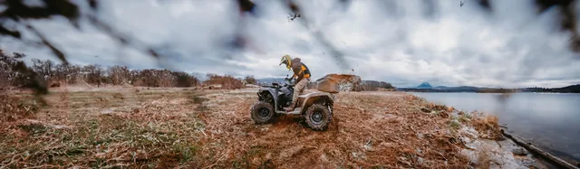 A rider navigating a quad bike through the rugged terrain of Marrakech.